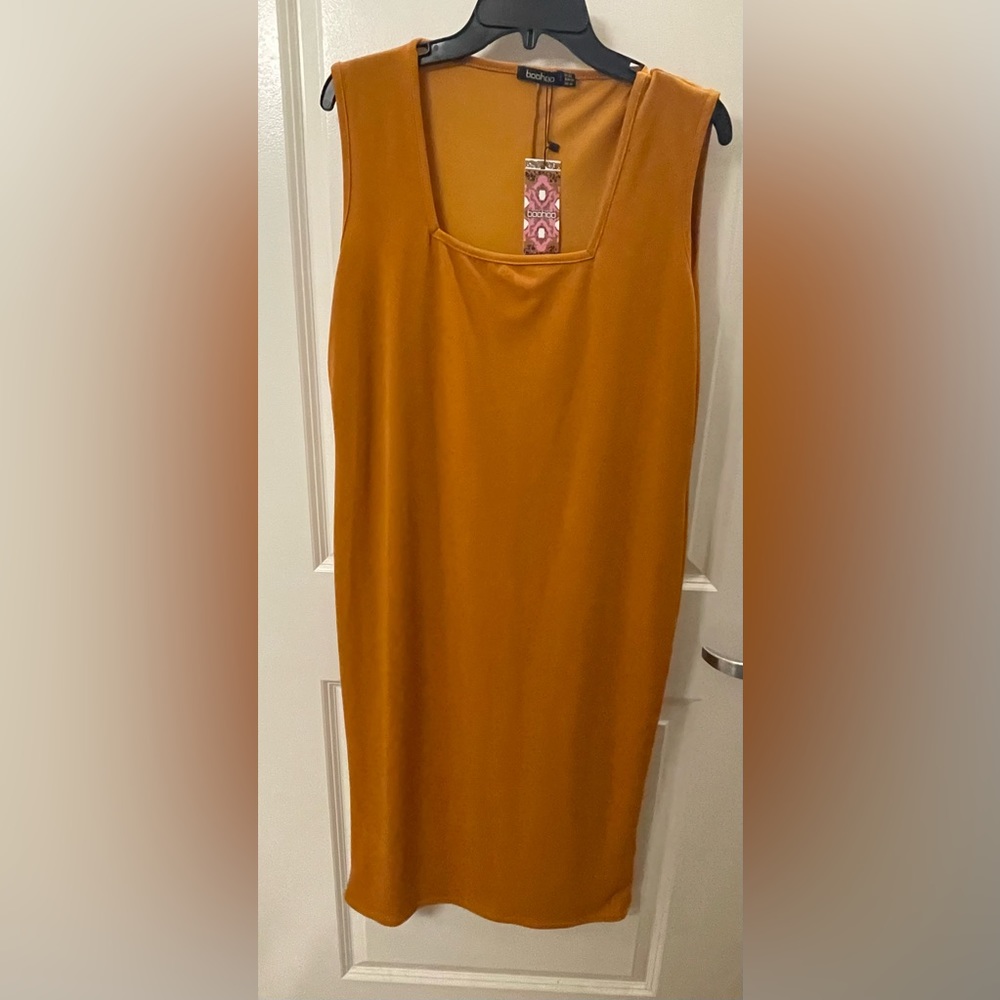 Yellow, never worn Boohoo midi dress. Tag still attached.